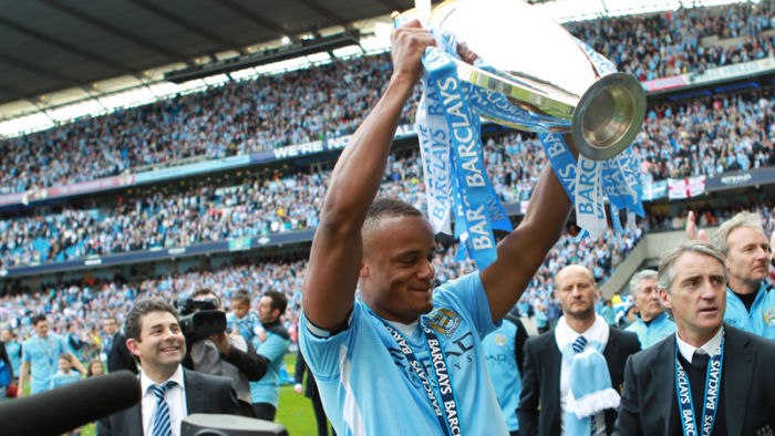 Vincent Kompany holding the cup